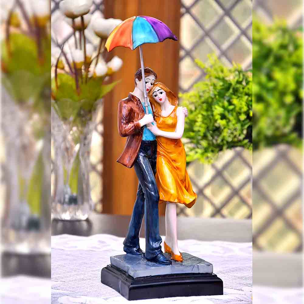 Figurine of Love Couple holding an Umbrella with a Teddy Bear Online  Call  8884243583  Statue of Love Couple holding an Umbrella with a Teddy Bear